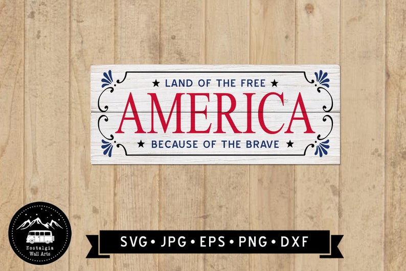 May include: A white wooden sign with blue and red accents. The sign reads "Land of the Free, America, Because of the Brave".