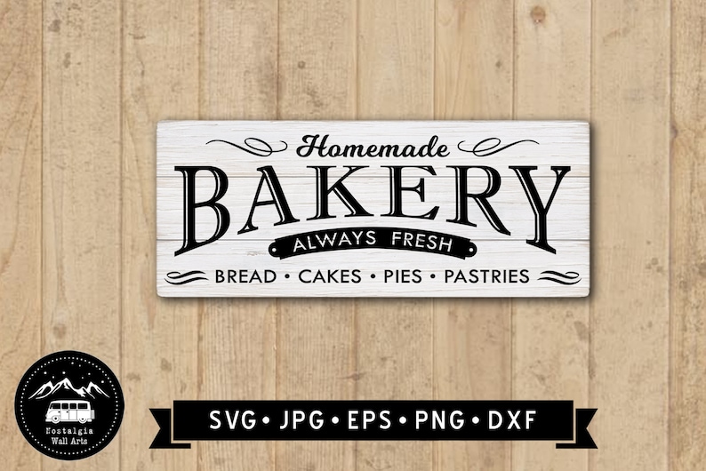 May include: White wooden sign with black text that reads "Homemade Bakery Always Fresh Bread Cakes Pies Pastries".