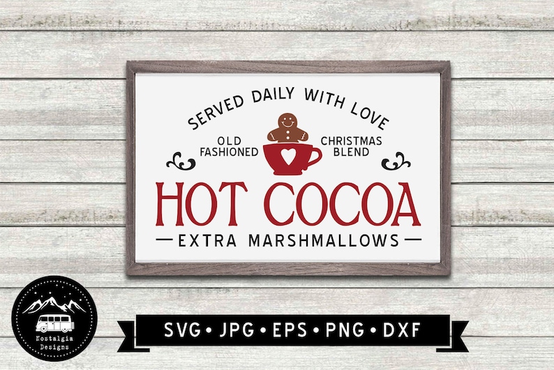 May include: A framed sign with a white background and a brown wooden frame. The sign reads "SERVED DAILY WITH LOVE" and "HOT COCOA" in red text. A gingerbread man and a red mug with a heart are in the center. The bottom reads "EXTRA MARSHMALLOWS".