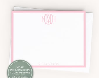 May include: A white rectangular note card with a pink border, featuring a pink monogram with the letters MMH at the top centre and the name MOLLY MARTIN printed in pink at the bottom. A circular green badge displays the text MORE INK & ENVELOPE COLOUR OPTIONS and Mary B Designs.