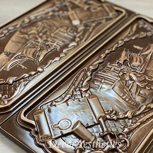 May include: Two wooden panels with intricate carvings of ships and nautical elements. The panels are stained a dark brown color and have a glossy finish. The carvings are detailed and realistic, and the panels would make a beautiful addition to any home decor.