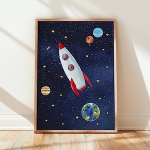 May include: A rectangular wall art print featuring a white and red rocket ship travelling through a dark blue starry night sky. The scene includes several colourful planets, including a detailed Earth, scattered among yellow stars and cosmic dust.