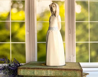NADAL PORCELAIN FIGURINE of a girl
