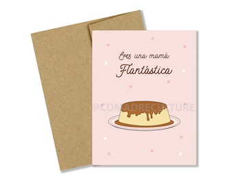 Pode incluir: Cartão com fundo rosa e ilustração de flan. O texto "Eres una mamá Flantástica" está escrito em castanho. Um envelope castanho está atrás do cartão.