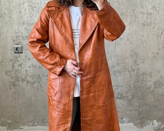 Vintage 90s genuine leather coat in orange