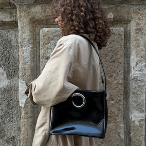 Vintage Cartier patent leather top handle bag in black