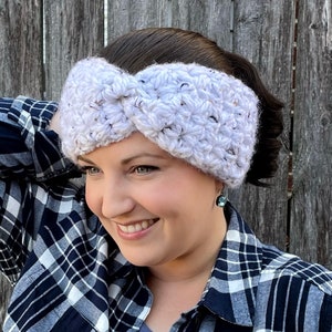 White Tweed Chestnut Crochet Earwarmer and Headband modelled on smiling dark haired woman.