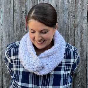 White Tweed Chestnut Crochet Cowl modelled on smiling dark haired woman.