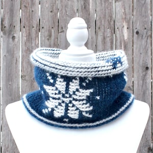 Dark Blue reversible Tunisian Crochet Cowl with white snowflake motif on mannequin, viewed from the front.