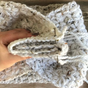 White Tweed Chestnut Crochet Cowl showing interlocking wrap construction detail.