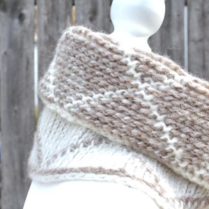 Cream and brown reversible Tunisian crochet cowl, worn folded over on mannequin in profile.