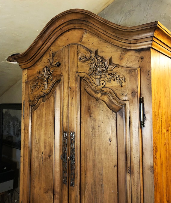 Hand carved armoire best sale