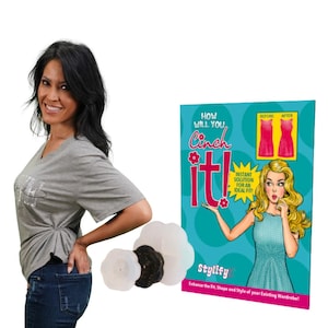 May include: A white and black flower-shaped clothing fastener with a central screw mechanism, displayed alongside a rectangular teal product box featuring a cartoon illustration of a blonde person and the text How Will You Cinch it!