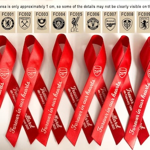 May include: Six red satin ribbons featuring the Arsenal football club logo and the white text 'Forever in our hearts' along with memorial dates. A chart at the top displays nine different football club logos with codes FC001 through FC009.