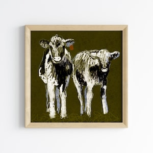May include: A framed illustration of two black and white cows standing on a green background. The cows are drawn in a simple, stylized manner.