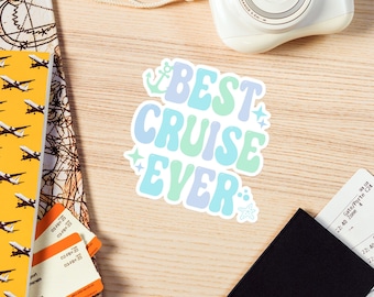 May include: A sticker with a blue, green, and purple design that says "Best Cruise Ever". The sticker has a small anchor, stars, and a seashell.