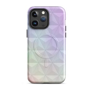 May include: A white phone case with a geometric pattern and a built-in ring holder. The case has a gradient of purple, pink, and blue colors.