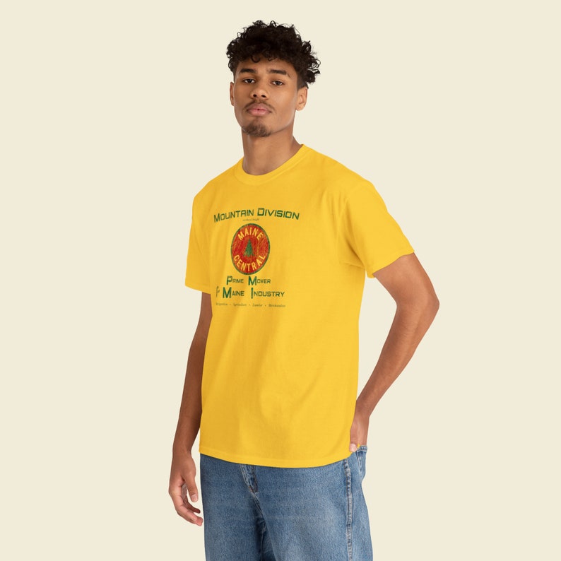 cool young man looking at you, wearing Yellow or Green Maine Central Railroad t-shirt