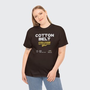 Young woman posing in brown Cotton Belt railroad shirt, a train enthusiast's delight