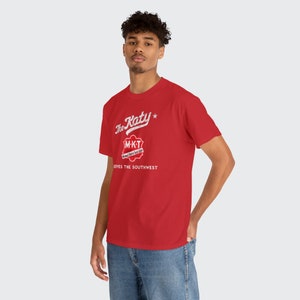 Trendy young man wearing Red/Gray Missouri-Kansas-Texas Railroad train tshirt, looking at you