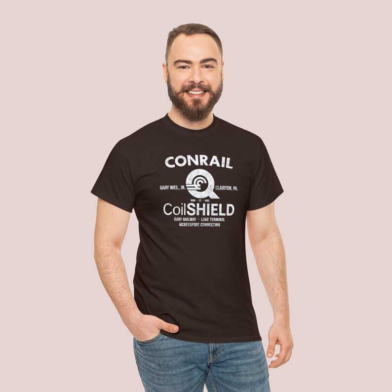 Happy man in his early 30's wearing Conrail Brown CR CoilSHIELD shirt, a comfortable railroad shirt