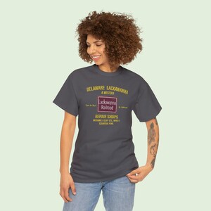 Happy young woman looking left, wearing a train lover gift, DLW shirt