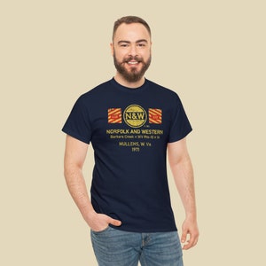 Man in his 20's wearing Navy Norfolk and Western Railway t-shirt. Train lover gift