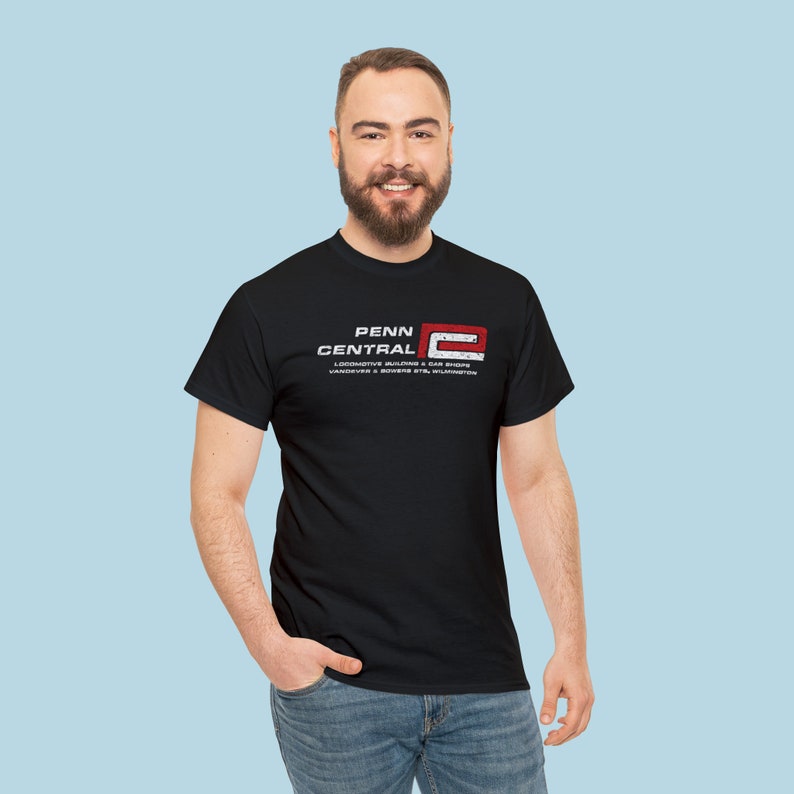 Trendy man in his 20's wearing black/red 'P' Penn Central Railroad t-shirt