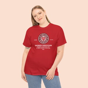 Confident young woman in her 20's posing in Red Seaboard Air Line Railroad t-shirt