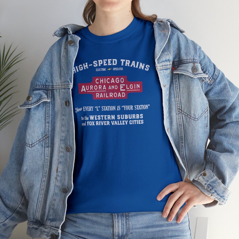 Lifestyle shot, woman pairs denim jacket with the CAE train shirt, a unique train enthusiast gift