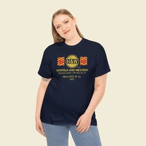 Young woman in her 20's wearing Navy Norfolk and Western Railway t-shirt. Train enthusiast gift