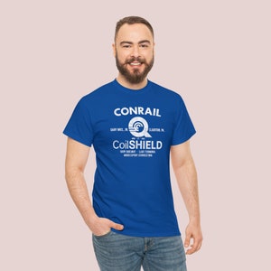 Happy man in his early 30's wearing Conrail Blue CR CoilSHIELD shirt, a comfortable railroad shirt