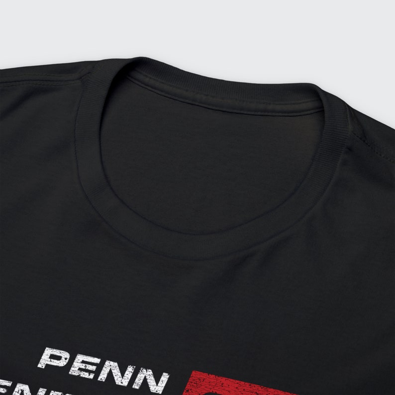 Closeup of front t-shirt collar neck ring on black/red 'P' Penn Central Railroad t-shirt