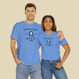 Young happy couple both wearing Blue Chicago, Rock Island & Pacific Railroad train shirts