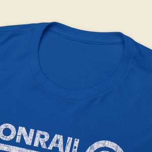 Closeup of front t-shirt collar neck ring on Conrail Royal Blue CR shirt, a unique railroad memorabilia