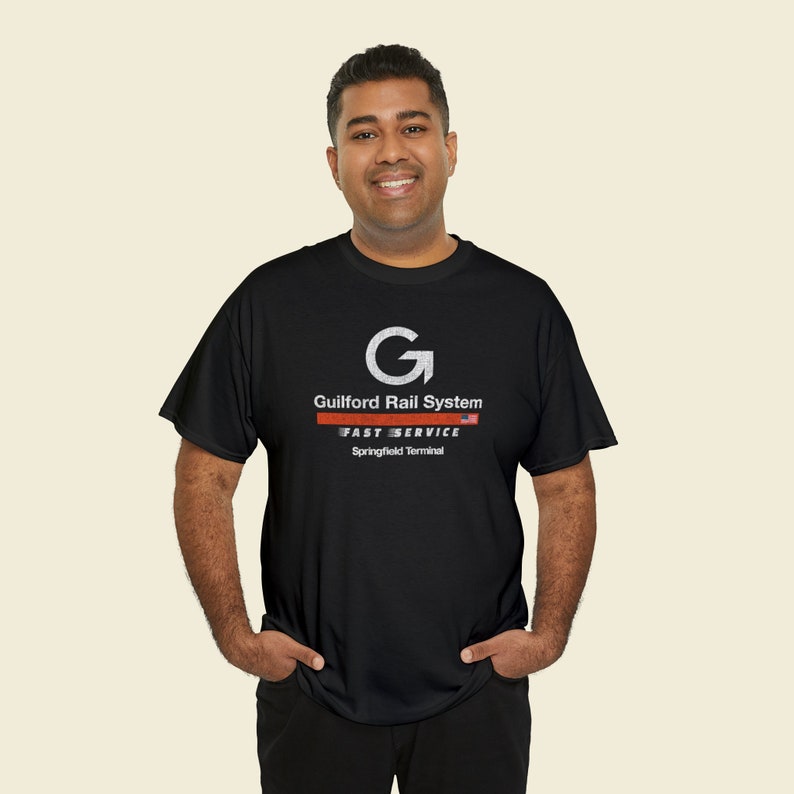 Man in his early 30's happily wearing Black Springfield Terminal Railway T-Shirt