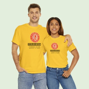 Happy young couple both wearing the Gold Virginian Railway t-shirt, perfect for train lovers