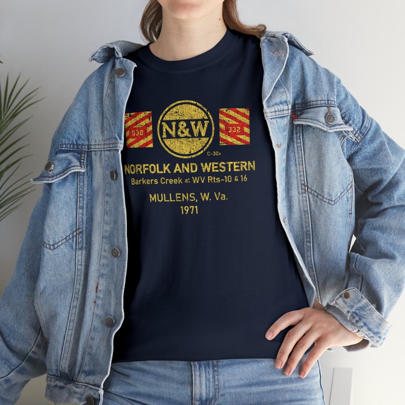Lifestyle: Woman wearing Navy Norfolk and Western Railway t-shirt with denim jacket
