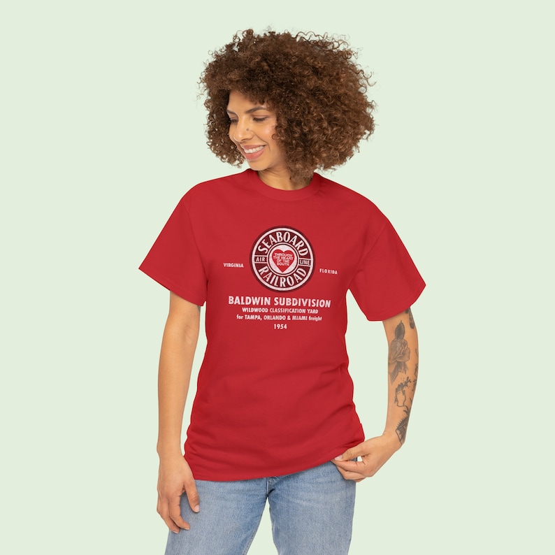 Happy young woman looking left, wearing Red Seaboard Air Line Railroad t-shirt