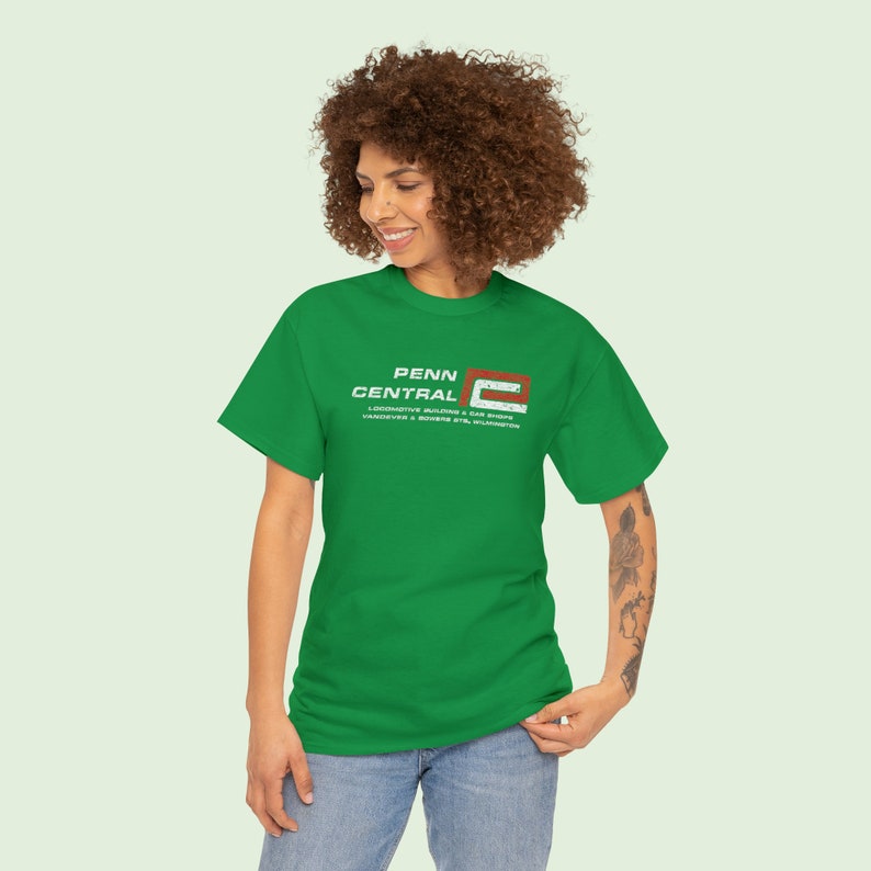 Stylish young woman in 20's wearing green/red 'P' Penn Central Railroad t-shirt