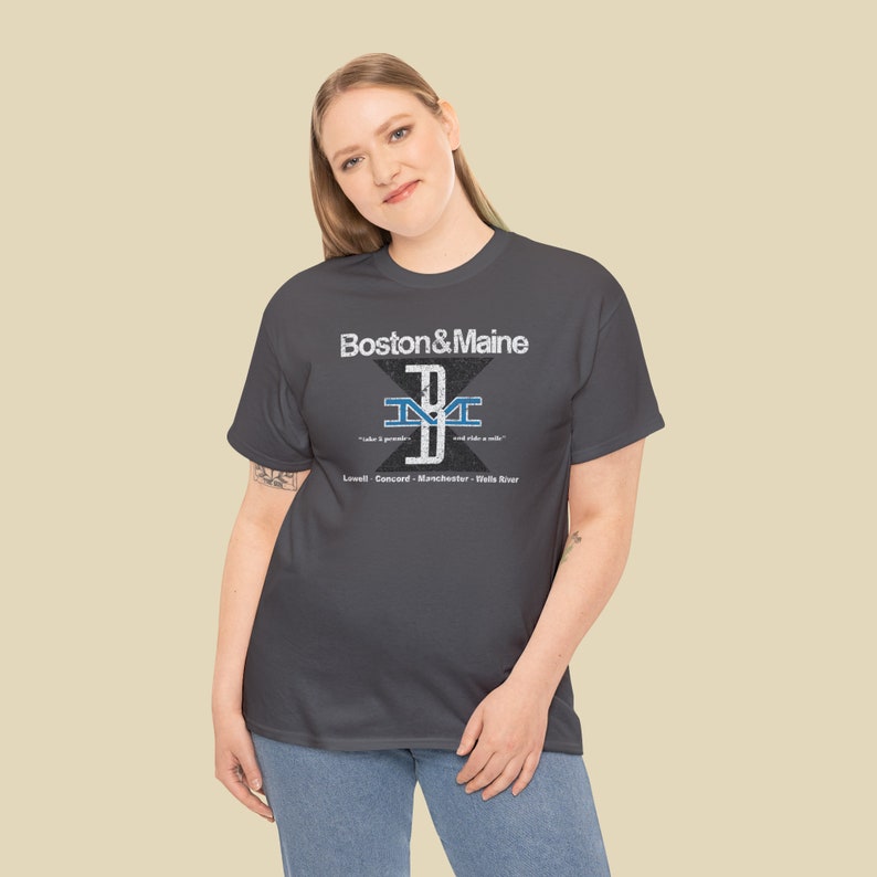 Woman in her 20s poses in the Boston and Maine Railroad t-shirt, a unique train lover gift