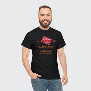 Cool man in his 20's wearing Black Milwaukee Road t-shirt, ideal train enthusiast gift