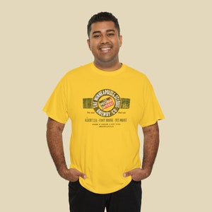 Happy man in his 30's wearing train t-shirt with Gold Minneapolis & St. Louis Railway logo