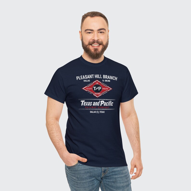 Cool man in his 20's wearing Blue Texas and Pacific Railway train t-shirt. Train enthusiast gift