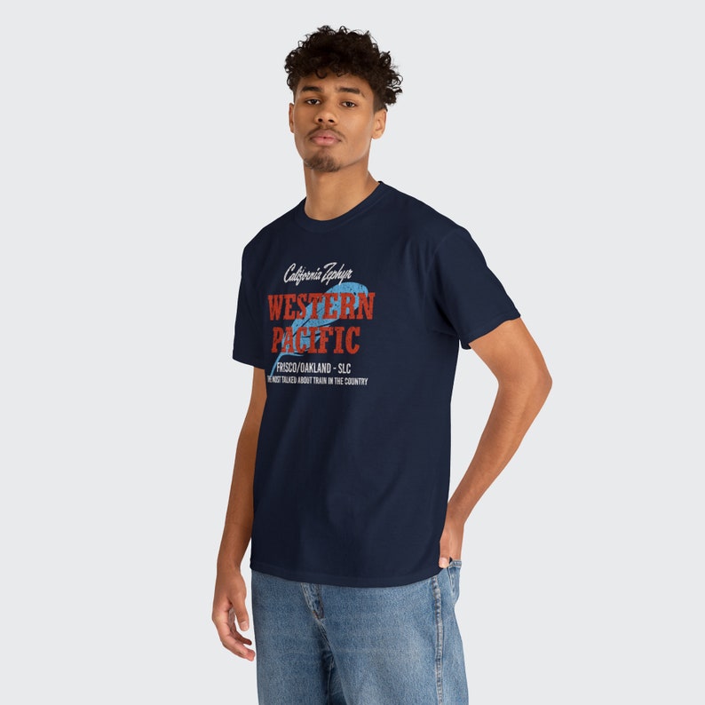 Trendy young man wearing Navy Western Pacific Railroad t-shirt, looking at you