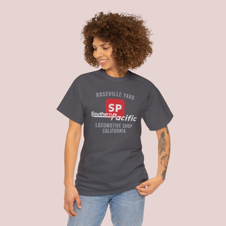 Happy young woman in Charcoal Southern Pacific Railway train shirt. Stylish train enthusiast gift