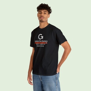 Cool young man wearing Black Springfield Terminal Railway T-Shirt, looking at you