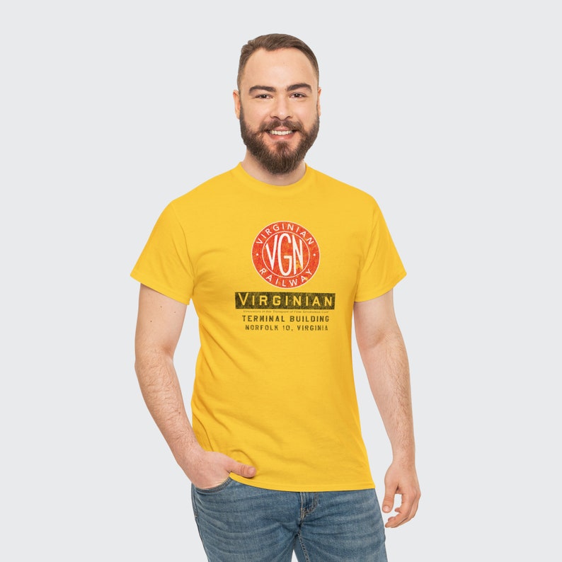 Stylish man in his 20's proudly wearing the Gold Virginian Railway t-shirt