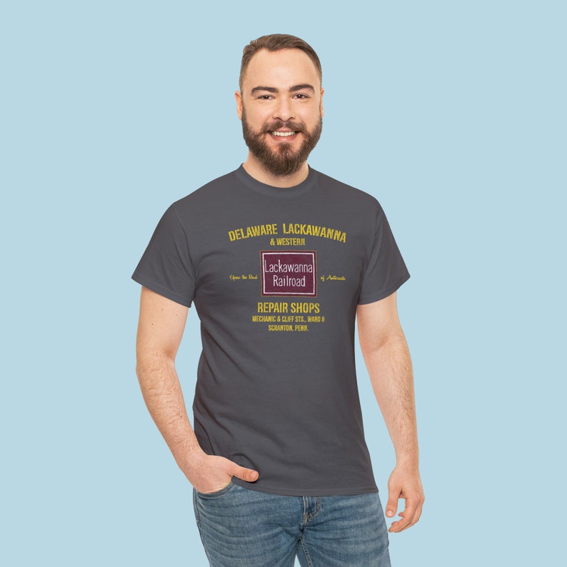 Man in his 20's wearing a DLW shirt, looking at you, train enthusiast gift