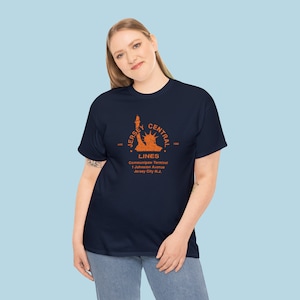 Stylish woman in her 20s poses in the Central Railroad of New Jersey CNJ t-shirt, a unique train enthusiast gift